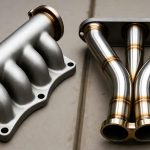 exhaust manifold vs headers